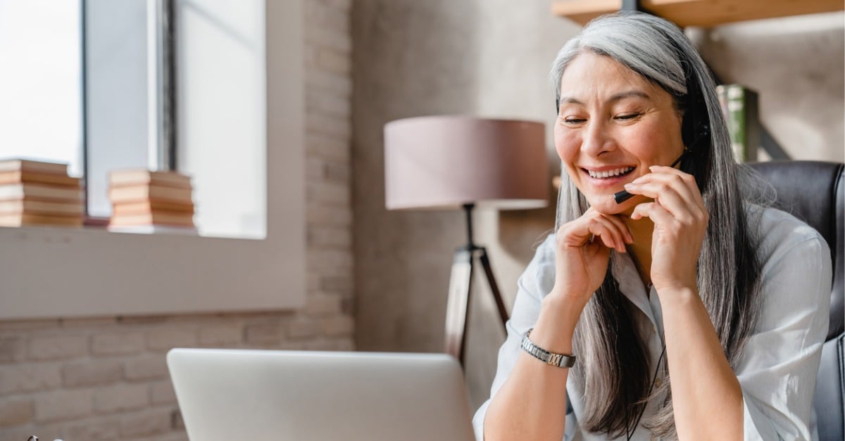 Photo showing a contact center agent working from home.